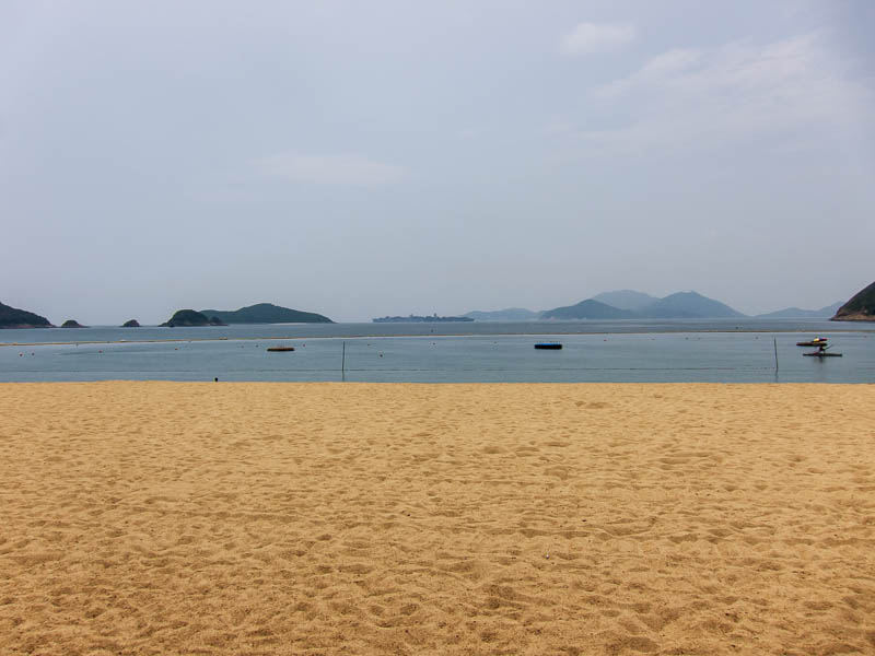 Hong Kong-Repulse Bay-Beach - The beach is picturesque, with the outlying islands and lots of big ships going past. The sand is not soft, its like the sand in Chennai, densely pack