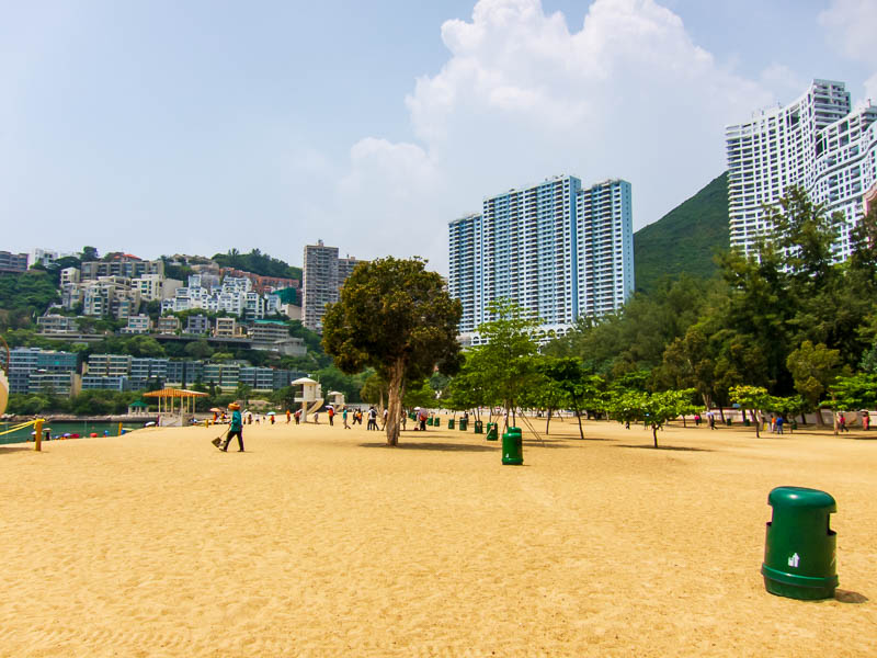 Hong Kong-Repulse Bay-Beach - I find it unusual that there are trees growing in the beach. Theres an army of people cleaning it constantly, more than there are people using the bea