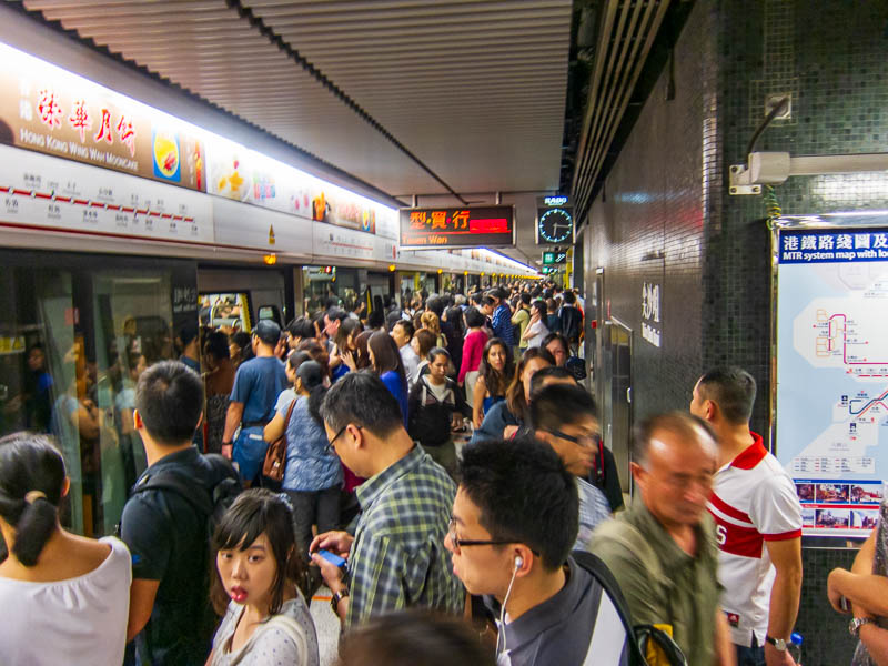Hong Kong-Kowloon-Night Market-Mall - Catching a train from Tsim Sha Tsui around 6pm is an experience. Theres a lot of people with signs that look like ping pong bats that bat you into the