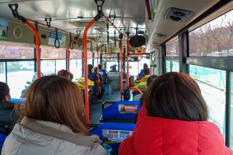 Korea again - Incheon - Daegu - Busan - Gwangju - Seoul - 2015 - On the bus, the girls in front of me got off mid journey, but at the end of the day they were waiting back on the bus to go home. I assume they didnt 