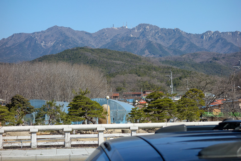 Korea-Daegu-Hiking-Gatbawi-Palgonsan - Theres my mountain, with the comms equipment on top. All day I was buzzed by F15 jets from an airforce base, I only glimpsed them occasionally, but I 