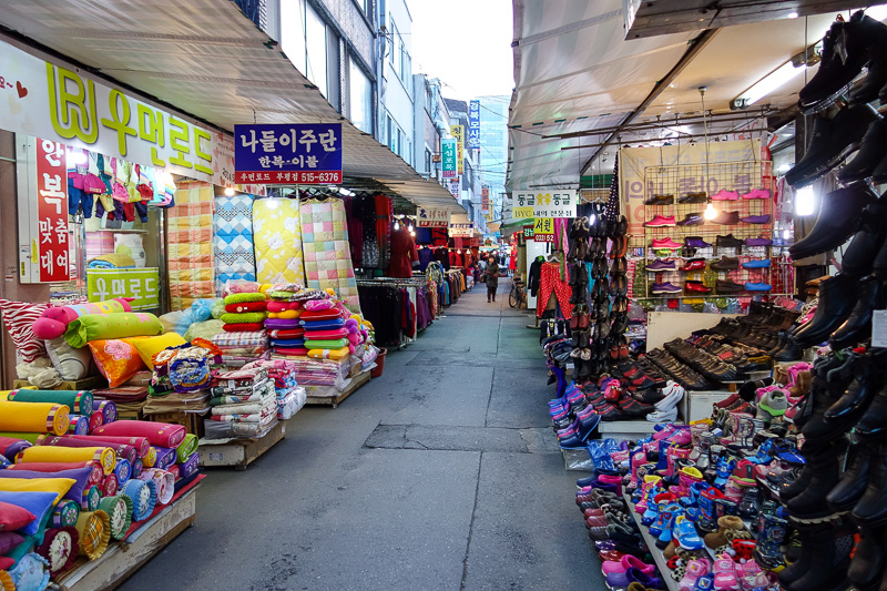 Korea again - Incheon - Daegu - Busan - Gwangju - Seoul - 2015 - Above ground, and the fashion market is more of a ghost town. Except you can see the fashion being made, out the back, nannas are strapped to desks, w