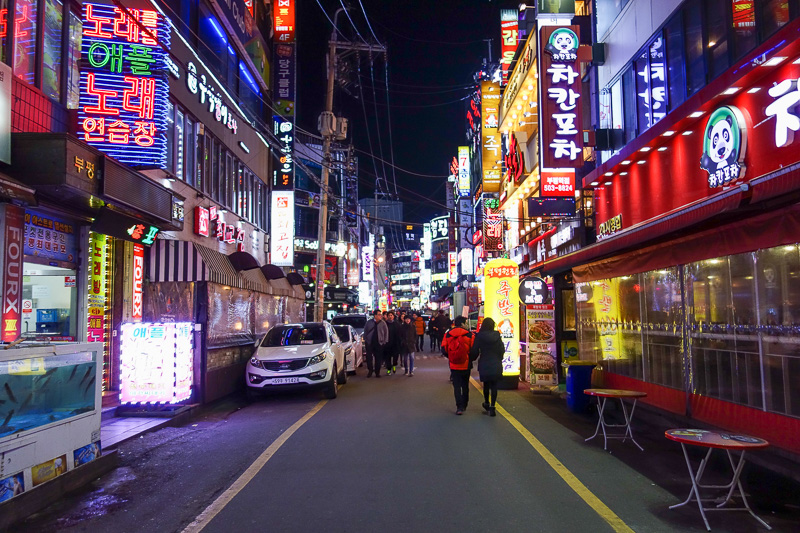 Korea-Bupyeong-Food-Dumplings - Random neon, the further you go the less stores, the more bars, and then the love hotels start. This is how the world works. You buy some poor girl so