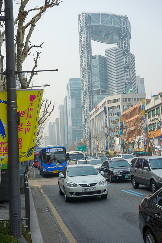 Korea again - Incheon - Daegu - Busan - Gwangju - Seoul - 2015 - Time to admire the impressive skyline. The pollution haze detracts from nature, but it often adds to photos such as this. The buildig in the foregroun