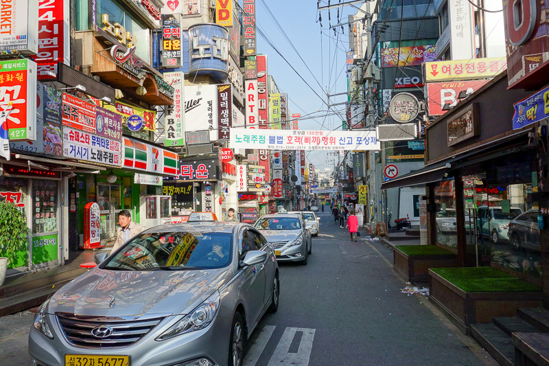 Korea-Seoul-Hiking-Bukhansan-Baegundae - One of the streets I walked along instead of catching the bus. Eventually hiking gear shops appeared, thousands of them. Not as nice and shiny new lik