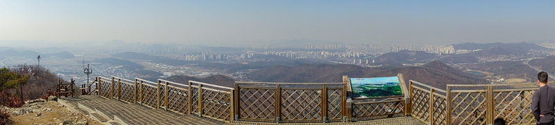 Korea-Hiking-Incheon - Heres a panorama from the top, looking back in the direction from where I had come. At about this time I was again subjected to 20 questions by a rand