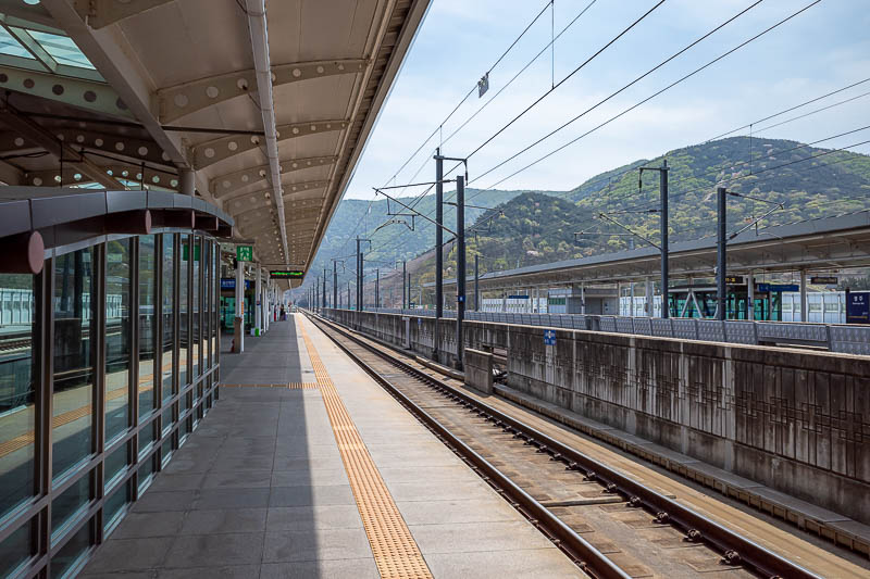 Korea-Gyeongju-Busan-Train - Now for some platform shots while I wait for my train. The station is between 2 mountains. Tunnels at each end of the platform.