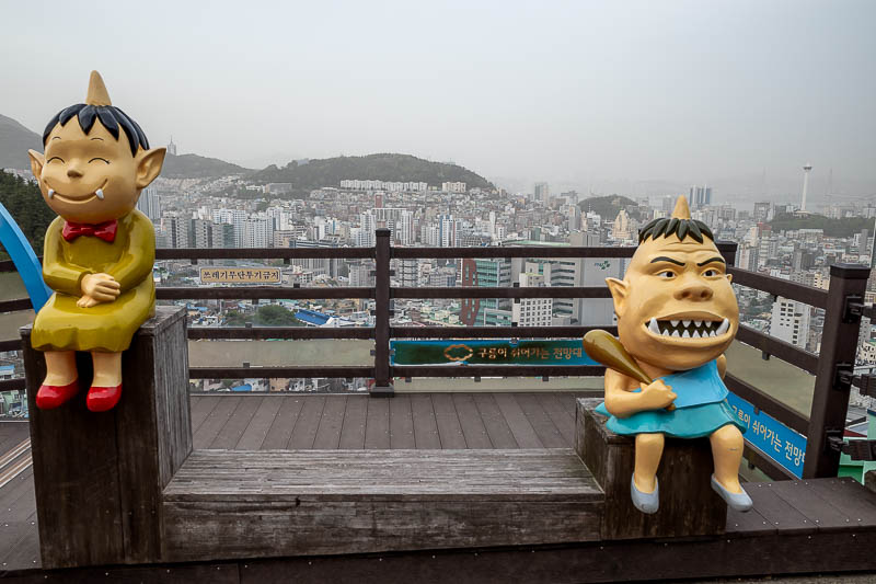 Korea-Busan-Gamcheon-Pollution - There are a lot of characters and cat statues and paintings of goofy things around here. I would say it is all Studio Ghibli inspired, but that might 