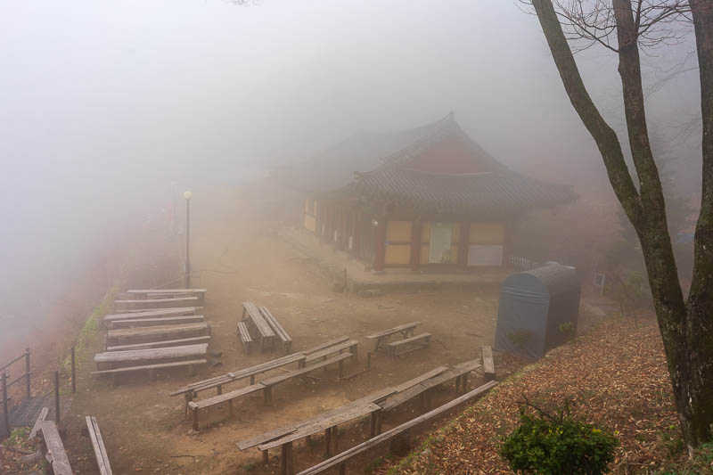 Korea-Hiking-Gyeryongsan - Here in the fog somewhere is a snack bar and outdoor seating to enjoy the view.