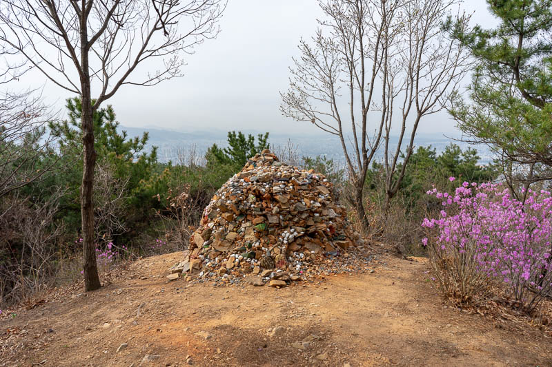 Korea-Daejeon-Hiking-Gyejoksan - They love to pile things up in Korea, bags of rubbish, rocks.