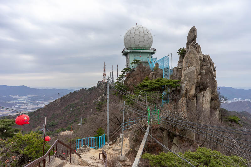 Korea - HK - China - KORKONG! - Behold, how to ruin the top of a mountain. This is only a small bit of the ruination, theres lots of other towers and razor wire in every direction.