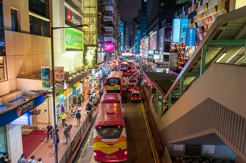 Hong Kong-Mong Kok - And shot 3 of 3 with many double decker buses. They are noisy and expel a gaseous blast of super heated air.