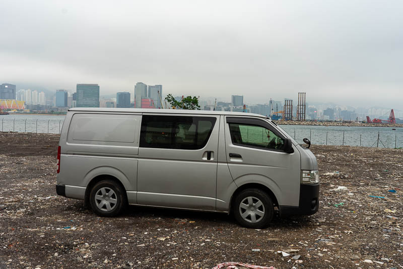 Hong Kong-Kowloon - I thought I found a way back to the water, instead I found this van abandoned in a field fall of churned up rubbish.