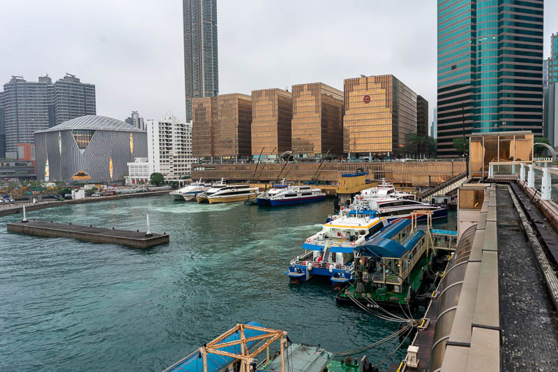 Hong Kong-Kowloon-Rain - Here are some actual ferries, their terminal is made of solid gold.