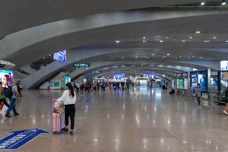 China-Hong Kong-Guangzhou-Train - The station is absolutely enormous and new. It is connected to the metro. I had no issue getting cash out and getting a Guangzhou metro card. It is ab