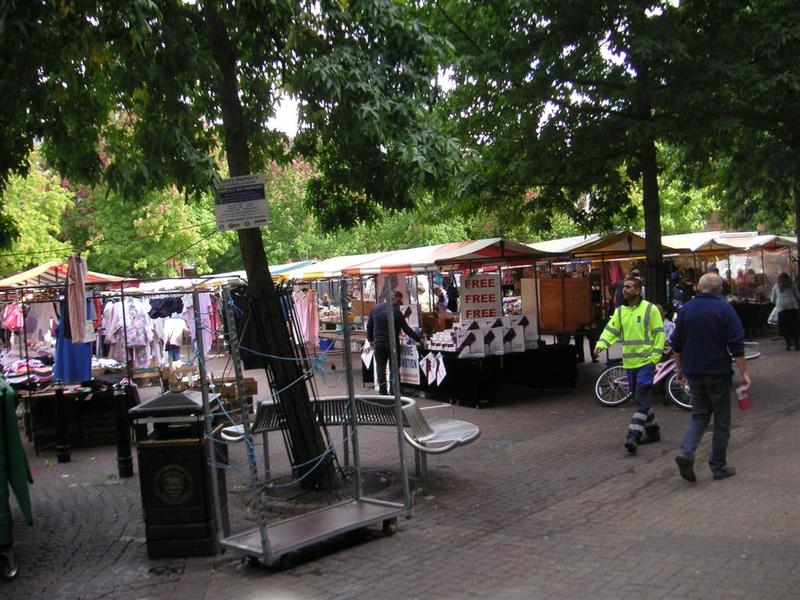 England-Oxford-Garden-Castle - A market, the meat on show out in the open unrefrigerated is something you wouldnt see in Australia.