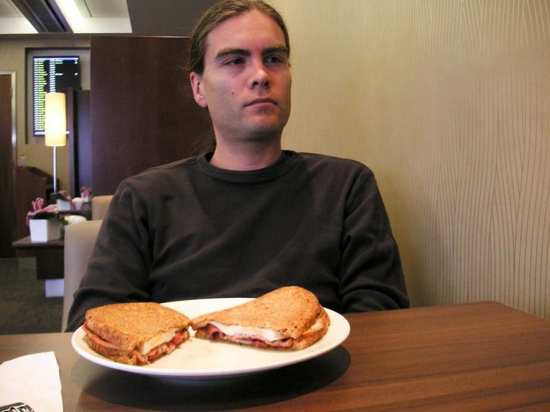 London again then Hong Kong - February 2010 - Here I am in the Galleries first lounge restaurant, enjoying a made to order bacon and egg sandwich, the first such thing I had on my trip despite it 
