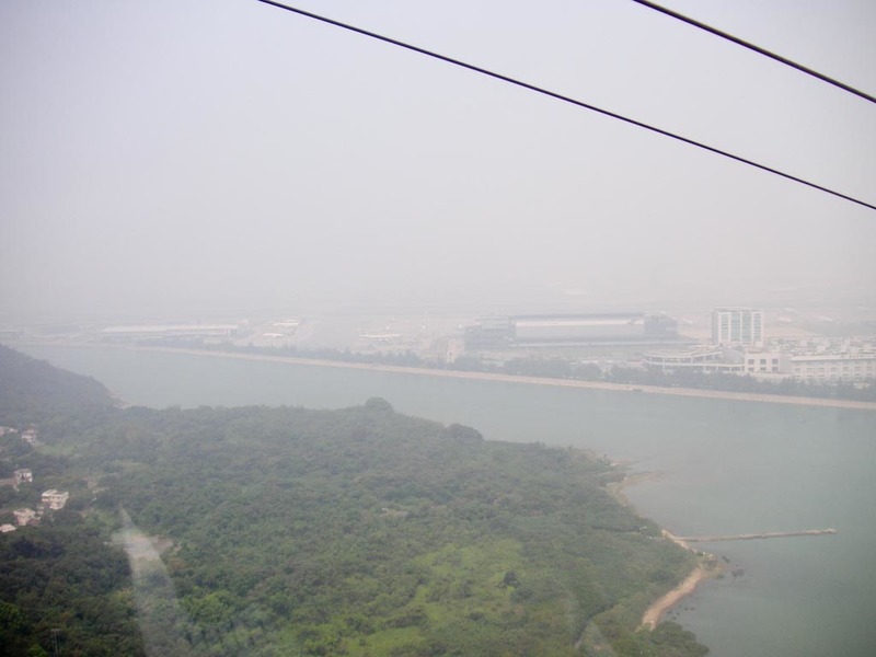 Hong Kong-Cable Car-Buddha-Po Lin - The best shot I could get of the airport, it was disappointing there was so much smog as I could see a hundred planes in there somewhere.