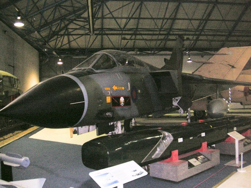England-London-Air Force Museum - A tornado, the black thing I think is one of those cool cluster bombs that are used to destroy runways, which was the best mission on the Tornado simu