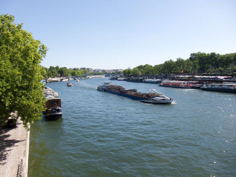 France-Paris-Arc de Triomphe-Eiffel Tower - The river sane, complete with garbage barge.
