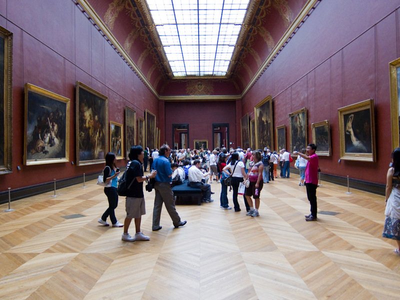 France-Paris-Museum-Louvre - A typical room full of paintings, all the old masters are represented.