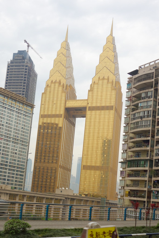Sichuan - China - Chengdu - Chongqing - March 2013 - And whilst I have seen gold ones, none as impressive as this twin tower gold monolith.