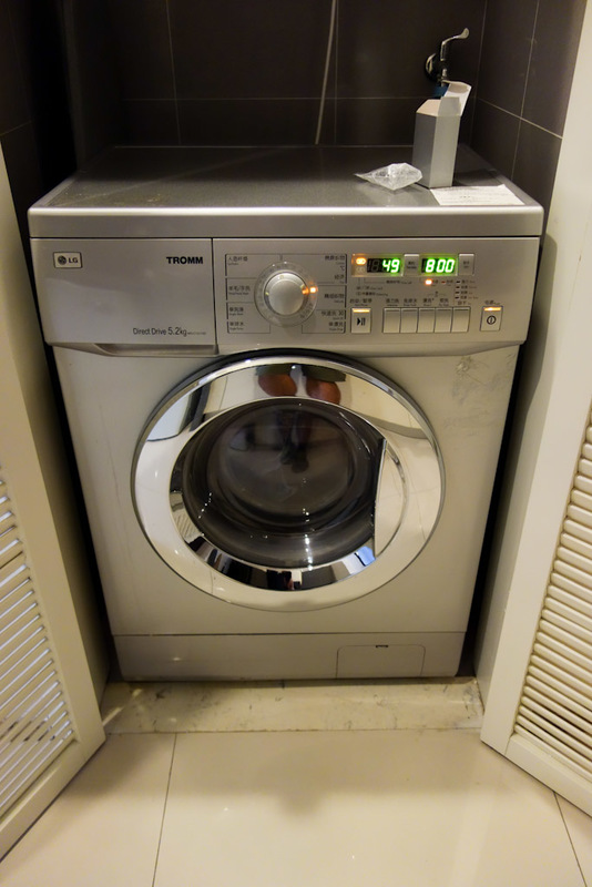 China-Chongqing-Eling Park-Fog - My hotel room has all kinds of great features, including this LG washer / dryer with laundry detergent provided. I stood and watched it for 10 minutes