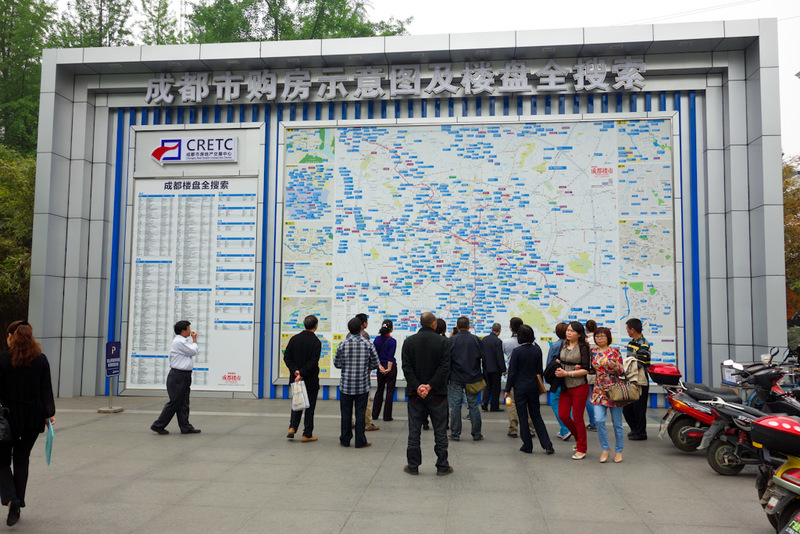 Sichuan - China - Chengdu - Chongqing - March 2013 - Walking back and I came across this giant map, with lots of people interested in it. What could it be, bus routes? Convenience store locations? No, it