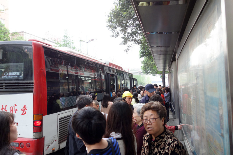 China-Chengdu-Panda-Research Base - Getting on a bus at this time of morning was really dangerous. They barely stop, are all 100% full and you charge into the street before it gets there