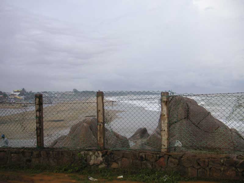 South East Asia December 2005 - Approaching the shore temple, I check once again for tsunamis, apparently the sea is very rough by indian standards, no fishermen dare venture out, it