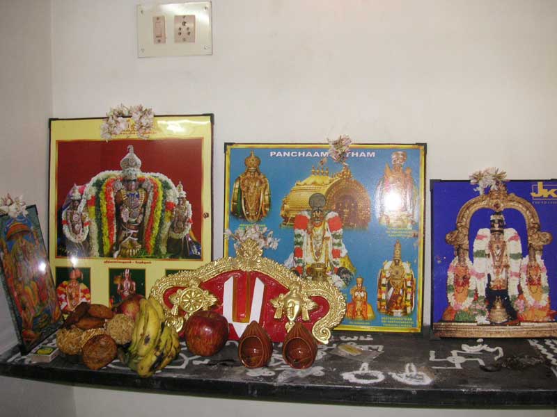 India-Chennai-Temple - The temporary prayer area inside the house, with food offered to the gods.