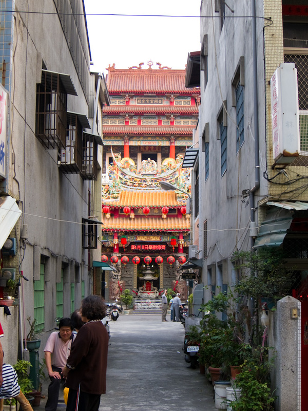 Taiwan-Kaohsiung-Pineapple Cake - You often find things down alleyways. This is the biggest temple I have seen, as far as I can tell this is the only entrance to get to it.