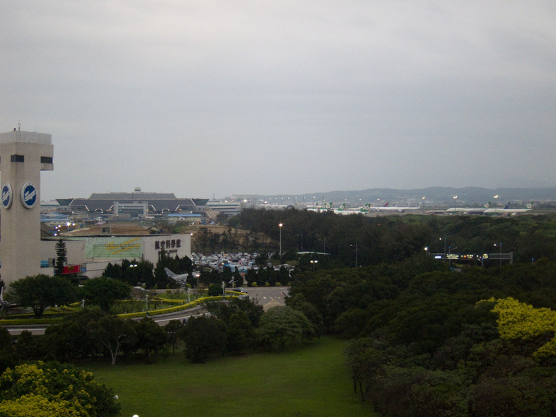 Taiwan-Taoyuan-Hong Kong-Airport - This is the view out of my hotel window in Taipei. Its great. You can watch planes take off and land on the runway to the left and right of this photo