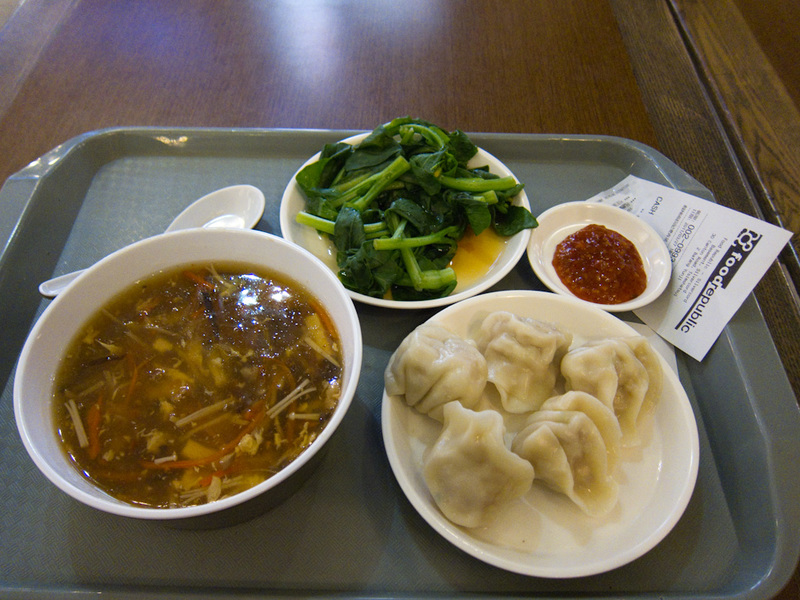 Hong Kong-Star Ferry-Food Court - Here it is, boiled mystery dumplings (they were very nice), with hot and sour soup (a soup thickened with egg whites) and steamed greens. It was very 