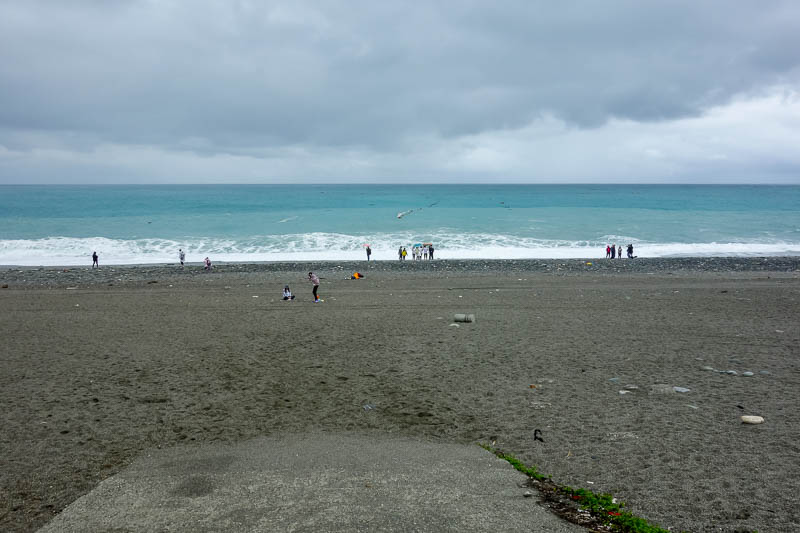 Taiwan-Hualien-Beach-Chisingtan-Cake - Some people were determined to enjoy the beach. Generally it involves standing near the edge of the water then screaming and running away.