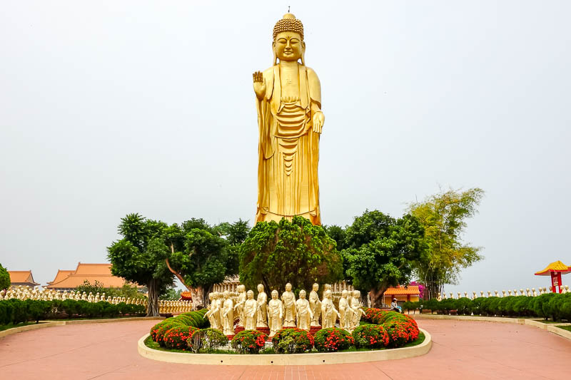 Taiwan-Kaohsiung-Fo Guang Shan-Buddha - Note the hundreds of gold statues surrounding enormous gold statue.