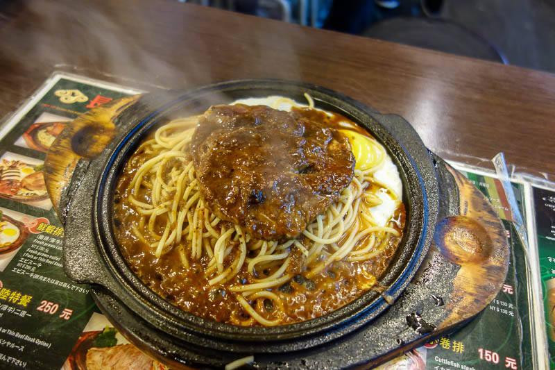 A full lap of Taiwan in March 2017 - I found a seat at a Taiwan steakhouse night market stand. Such things are very popular all over Taiwan. It is a good piece of steak, on top of pasta a