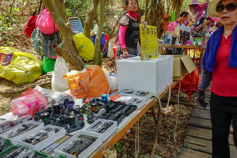 Taiwan-Kaohsiung-Hiking-Shoushan-Chaishan - The start of each trail has some stalls selling hiking equipment, boots, gloves, poles, head torches, and of course, small transistor radios to listen