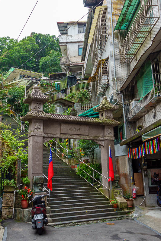 Taiwan-Taipei-Hiking-Maokong Trail - Staircase with flags. Very Auspicious. Apparently today a Taiwanese guy won a Taekwondo event in Korea and then decided to be presented with his medal