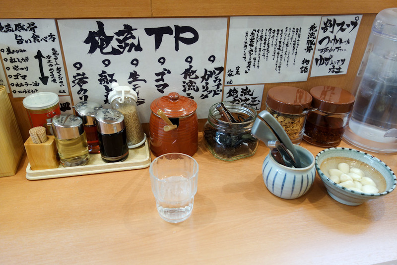Japan-Tokyo-Shibuya-Rain-Ramen - My restaurant choice was made by the rain. This place has many condiments.